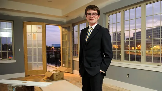 David Matthews standing in East Bank Townhome